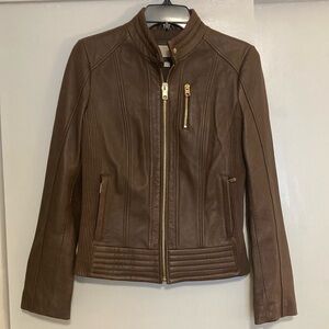 MK, size S, brown leather jacket. Unworn, no tags